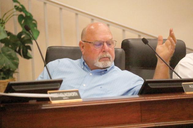 Columbia County Commissioner Rocky Ford said if the county wasn’t going to finish acquiring property to pave Mayo Road then it should give the property already acquired back to the residents. (JAMIE WACHTER/Lake City Reporter)