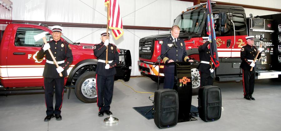 The Suwannee County Fire Rescue Honor Guard stand at attention as Fire Chief Dan Miller prepares to speak at the grand opening of Station 6 on Aug. 19. (ROB WOLFE/Lake City Reporter)