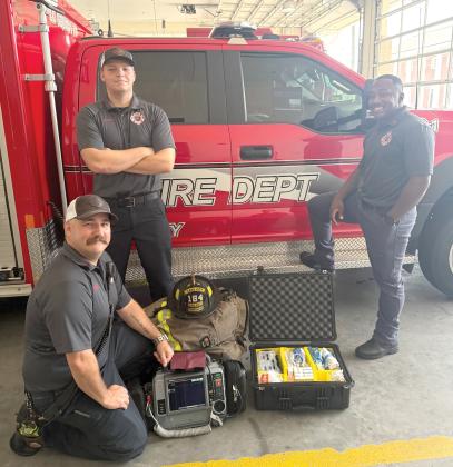 Lake City Fire Department driver/engineer and paramedic Chris Bethea (from left) and firefighters Jayden Britton-Drew and Nate Williams II are pictured with the department’s first Advanced Life Support engine. It went into service Saturday. (COURTESY)