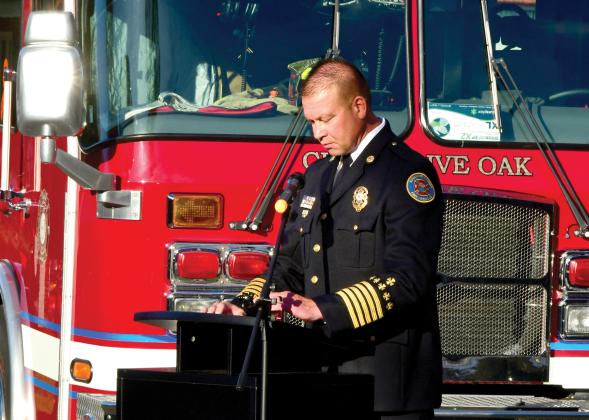 Suwannee County Fire Chief Dan Miller speaks at the Patriot Day ceremony Friday. Miller and his department are going to take over fire protection services in Branford following a vote of the town council last week. (ROB WOLFE/Lake City Reporter)