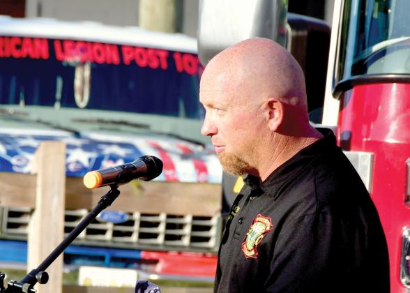 Kyle Nickerson, speaking at the annual Patriot Day ceremony on Friday, has been named Live Oak’s new fire chief. (ROB WOLFE/Lake City Reporter)