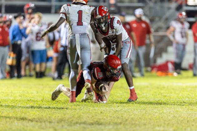 Lafayette defensive back Tucker Higginbotham seals the victory with an interception against Dixie County in the final minutes Friday. (JACK HOWDESHELL/Lake City Reporter)