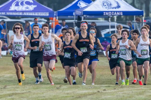 Branford's Logan Haley (2623) leads his teammates and the field at the start of the Run Florida Invitational on Saturday. (JACK HOWDESHELL/Lake City Reporter)