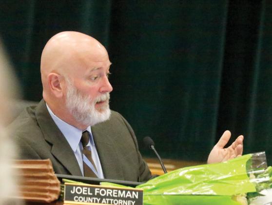 Columbia County Attorney Joel Foreman told the County Commission that the state government basically has tied its hands on how to set its permit fees moving forward. (JAMIE WACHTER/Lake City Reporter)