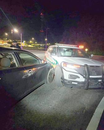 A Columbia County Sheriff’s Office vehicle was hit after, according to a Florida Highway Patrol release, a 26-year-old Lake Butler man was woken up after falling asleep at the wheel of his car. (COURTESY)