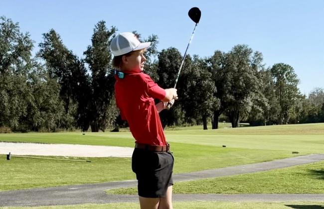 Lafayette golfer Cooper Kerby swings away during Thursday’s match against Madison County. (COURTESY)