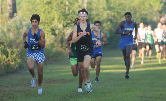 Suwannee runners Logan Haley races to his runner-up finish at the Suwannee Invitational on Saturday. (PAUL BUCHANAN/Lake City Reporter)