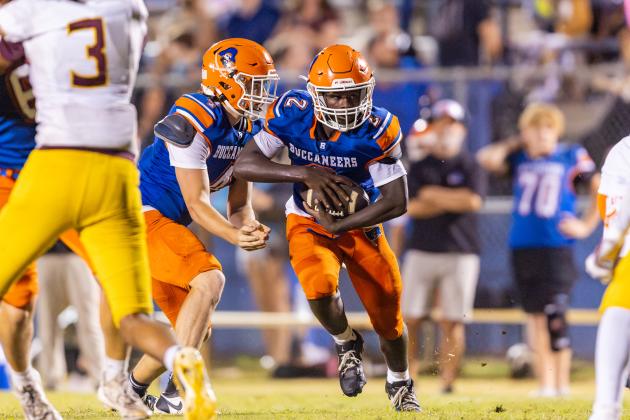 Buccaneers running back Ollie James score multiple touchdowns in Friday's 42-20 win over St. Joseph Academy. (FILE)