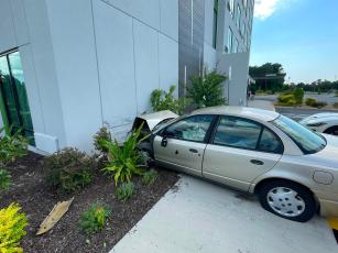 A car crashed into the Courtyard by Marriott hotel along U.S. Highway 90 on July 1. (COURTESY LAKE CITY FIRE DEPARTMENT)