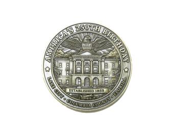 Columbia County's Kimi Roberts and her team commissioned 3,000 commemorative coins to mark the country's 250th anniversary. (MORGAN MCMULLEN/Lake City Reporter)