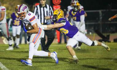 Columbia linebacker Bryson Grinstead tries to chase down Bolles running back Xander Edwards on Oct 31, 2025. (FILE)