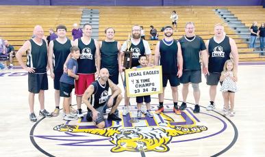 The Legal Eagles team of attorneys and judges from the Columbia County Courthouse won the Boots and Badges tournament Saturday, their fourth straight title in the event. (COURTESY)