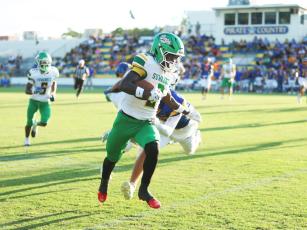 Suwannee receiver Ajari Williams heads to the end zone for a touchdown against Crystal River last Friday. (PAUL BUCHANAN/Lake City Reporter)
