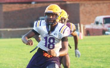 Columbia receiver Shaheed White breaks open for a catch during Monday’s practice. (JORDAN KROEGER/Lake City Reporter)