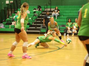 Suwannee DS Makenzie Taylor dives to defend a shot against Lafayette on Sept. 1. (PAUL BUCHANAN/Lake City Reporter)