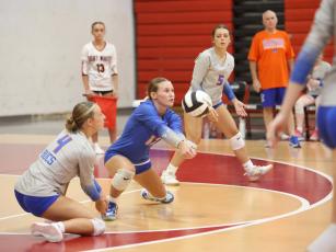 Branford libero Ava Alcorn defends a shot against Fort White on Sept. 22. (PAUL BUCHANAN/Lake City Reporter)