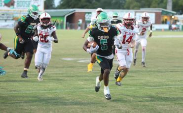 Suwannee receiver Kamari Lovett returns a punt for a touchdown Friday against Hamilton County. (PAUL BUCHANAN/Lake City Reporter)