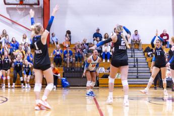 Branford's volleyball team celebrates a point against Lafayette on Aug. 27. (JACK HOWDESHELL/Lake City Reporter)