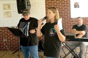 Natalie Moore, Living Hope executive director, speaks at the Hope in Every Tep Walk event Tuesday night. (TONY BRITT/Lake City Reporter)
