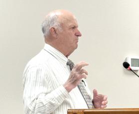Richard Powell, who consults the North Florida Water Utilities Authority on financials, said the group could readdress the budget after three months to see what impact the rate changes have on the revenue. (JAMIE WACHTER/Lake City Reporter)
