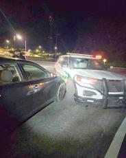 A Columbia County Sheriff’s Office vehicle was hit after, according to a Florida Highway Patrol release, a 26-year-old Lake Butler man was woken up after falling asleep at the wheel of his car. (COURTESY)