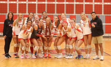 Lafayette poses with its District 5-R championship trophy after its 3-1 win over Aucilla Christian on Thursday. (MORGAN MCMULLEN/Lake City Reporter)