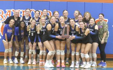 Branford poses with its District 6-R championship trophy after its 3-1 win over Union County on Thursday. (MORGAN MCMULLEN/Lake City Reporter)