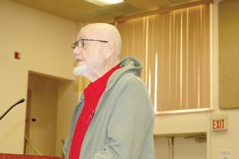 Mickey Garrett, reading a prepared statement for the Columbia Teachers Association, requested the Columbia County School District increase transparency when it comes to employees’ take home pay. (TONY BRITT/Lake City Reporter)