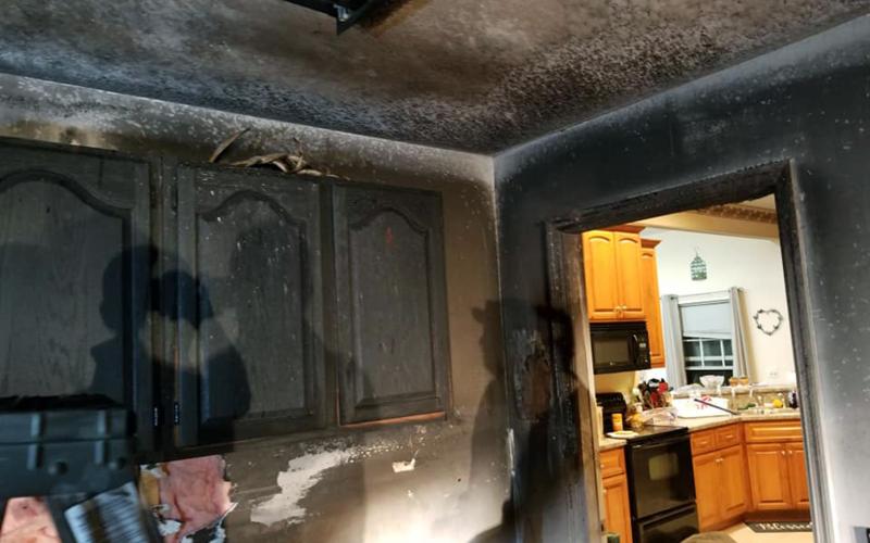 The garage of James and Athena Allen’s Bryceville home shows heavy fire damage. Family members were able to extinguish the flames before firefighters arrived Nov. 23. Photo courtesy of the Allen family.