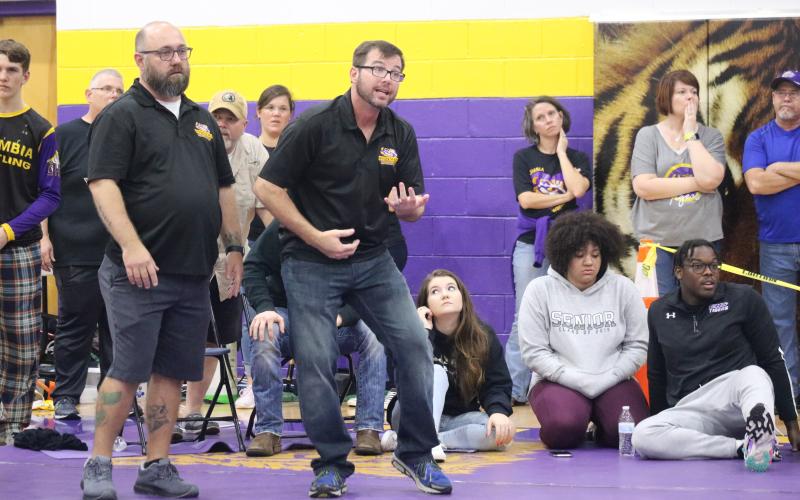 Columbia coach Pete Whittington yells out instructions to Cooper Mote during the Tiger Duals on Saturday. (JORDAN KROEGER/Lake City Reporter)