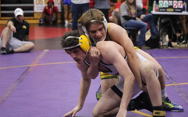 Alex McGuigan wrestles against Valdosta during the Tiger Duals on Saturday. (JORDAN KROEGER/Lake City Reporter)