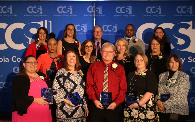 Columbia County Schools’ Teacher of the Year representatives: Tiffany Smith (front row, from left), Rebecca MacLaren, Alan Gatzke, Jessica Milton and Phyllis Dreger. (Middle row, from left): Charquita Dillard, Kim Mixon, Amanda Burgess and Heather Giebeig. (Back row, from left): Mary Dew, Rachelle Lilly, John Cole, DeShay Harris and Erinn Koch.  (TONY BRITT/Lake City Reporter)