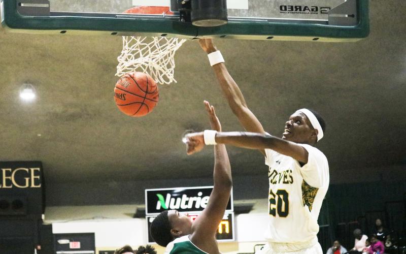 FGC center Jeremiah Tisme dunks against Webber International’s JV team on Wednesday night. (JORDAN KROEGER/Lake City Reporter)