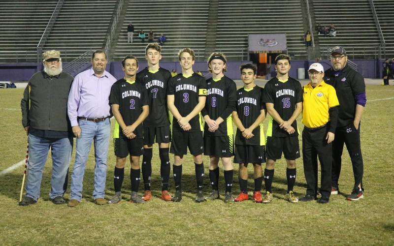 Columbia seniors Alec Villar (2), Max Bavar (17), Garrison Land (3), T.J. Hudson (6), Jeremy Erickson (8) and Garrett Fennell (15) were honored at halftime during Monday’s win over Taylor County. (JORDAN KROEGER/Lake City Reporter)