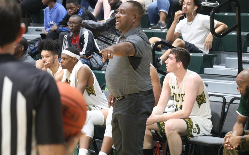 FGC coach Charles Ruise calls out a play to his team during Saturday’s game against Pasco-Hernando. (JORDAN KROEGER/Lake City Reporter)