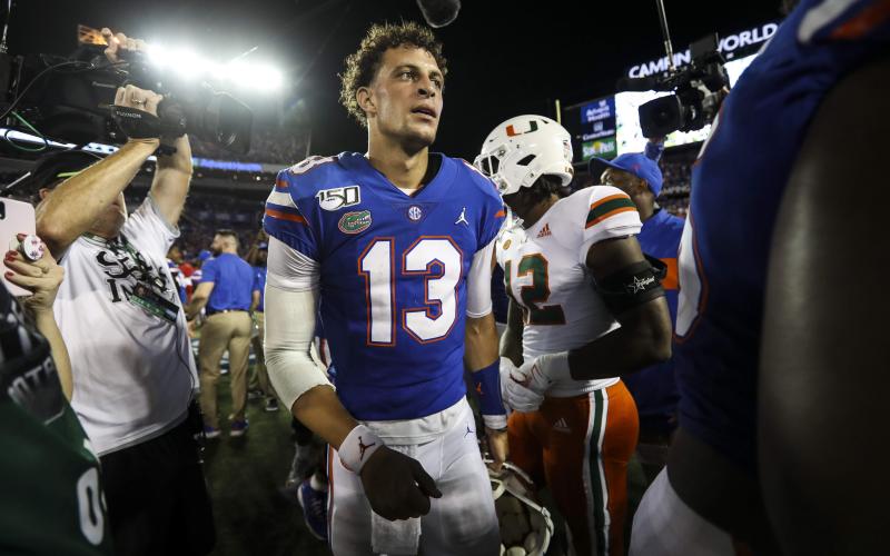 Former Florida quarterback Feleipe Franks walks off the field after the Gators' win over Miami on Aug. 24, in Orlando. (TRIBUNE NEWS SERVICE)
