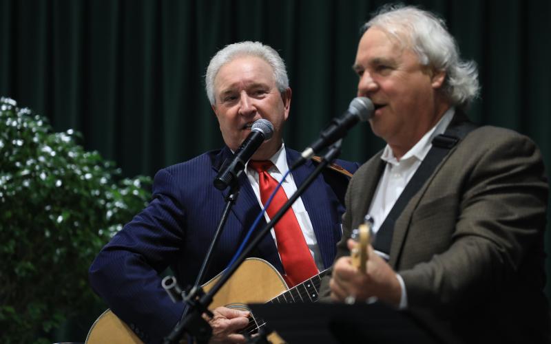 Retired Circuit Judge Vernon Douglas, left, who served as master of ceremonies, also joined the band for a few numbers. (CAMERON VINING/Special to the Reporter)