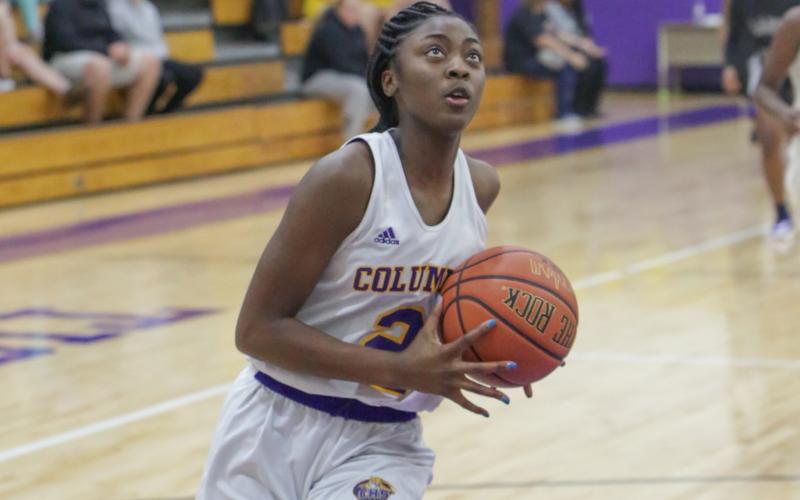Columbia guard Na’Haviya Paxton drives to the basket against Gainesville on Nov. 19, 2019. (BRENT KUYKENDALL/Lake City Reporter)