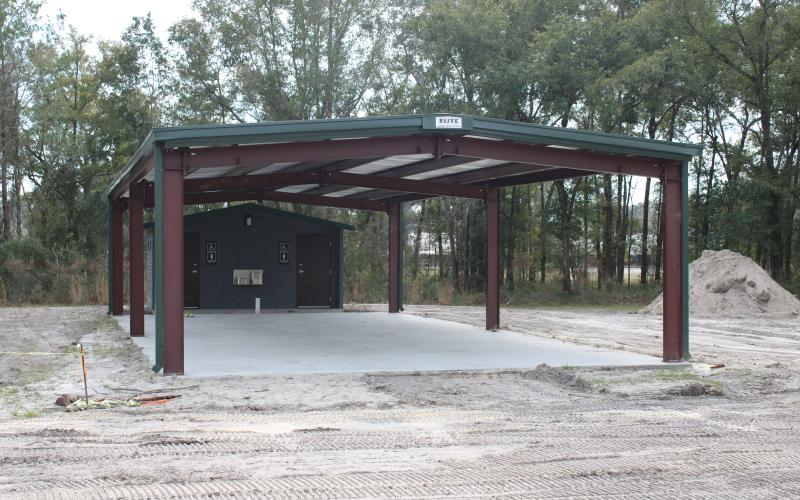 A pavilion was recently added to the site that will serve as the county’s first ADA-exclusive playground.                                 on Southwest Bishop Avenue, behind the Columbia City voting precinct building. (TONY BRITT/Lake City Reporter)