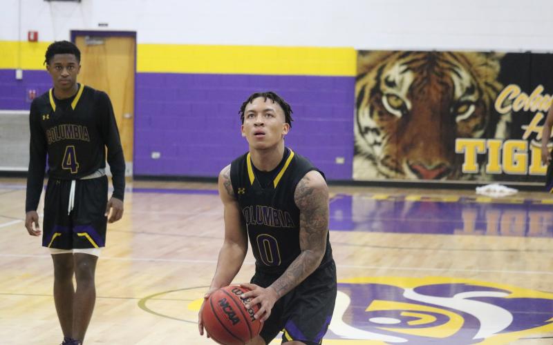 Columbia guard Jordan Smith sets to shoot a free throw against Lincoln Saturday night.  (JORDAN KROEGER/Lake City Reporter)