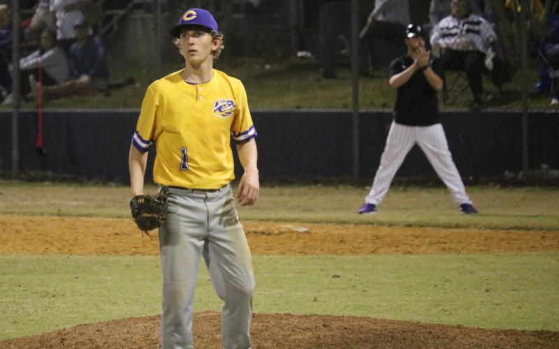 Columbia pitcher Cole Chancey awaits a throw during Tuesday’s game against Gainesville. (ZACH ABOLVERDI/Lake City Reporter)