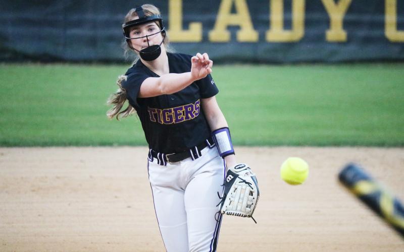 Columbia pitcher Emma Edson hurls a pitch to the plate against Buchholz on Tuesday night. (ZACH ABOLVERDI/Lake City Reporter)