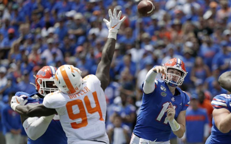 Florida quarterback Kyle Trask threw for 293 yards in his first career start Saturday. (ASSOCIATED PRESS/JOHN RAOUX)