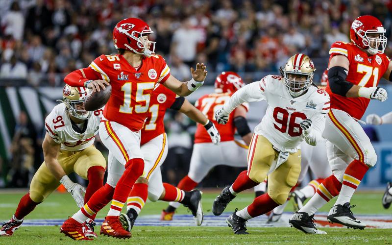 Kansas City Chiefs quarterback Patrick Mahomes (15) looks to pass against the San Francisco 49ers during the first half of Super Bowl LIV at Hard Rock Stadium on Sunday, in Miami Gardens. (AL DIAZ/Miami Herald/TNS)