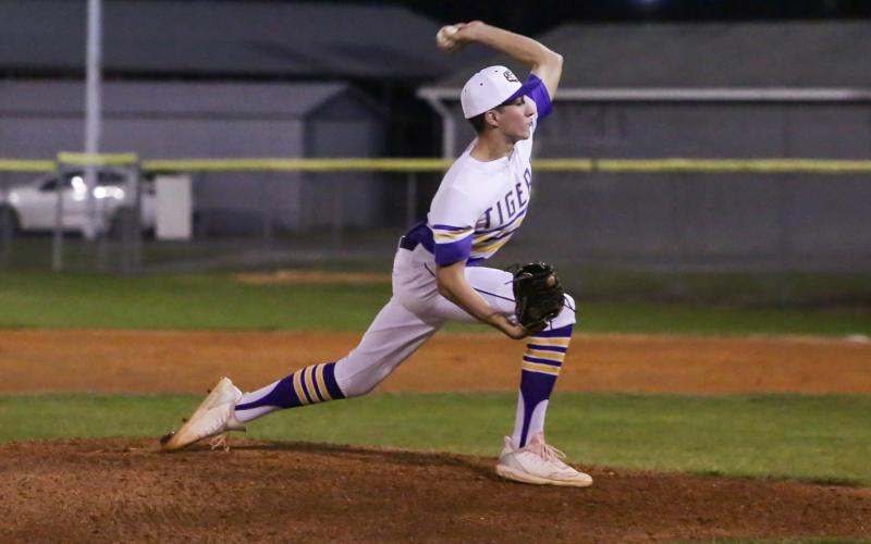 Columbia pitcher Luke Dotson throws a pitch against Forest on March 3. (BRENT KUYKLENDALL/Lake City Reporter)