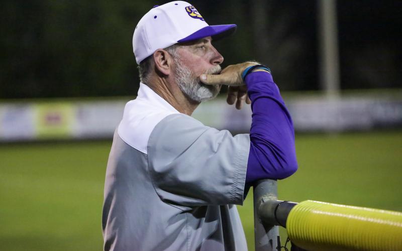 Columbia coach Brian Thomas looks on during the Tigers’ game against on March 3. (BRENT KUYKENDALL/Lake City Reporter)