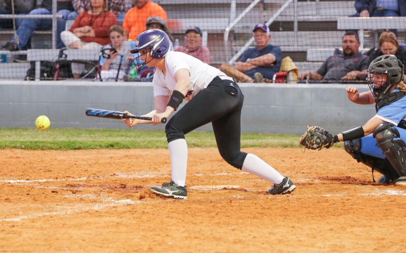 Columbia first baseman Addison Maxwell lays down a bunt against Chiefland on March 10. (BRENT KUYKENDALL/Lake City Reporter)