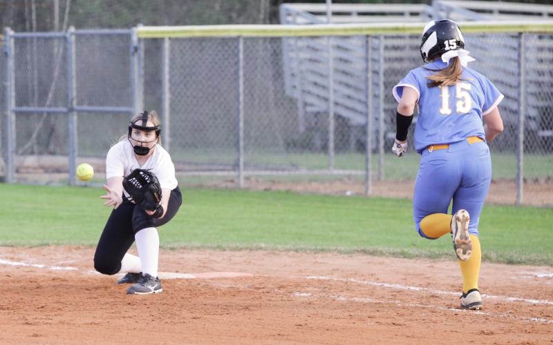Columbia first baseman Addison Maxwell records an out against Chiefland on March 10. (BRENT KUYKENDALL/Lake City Reporter)