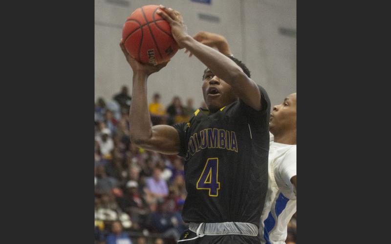 Columbia’s Kenney Gaines (4) goes up for a basket against Dillard during the second half of their Class 6A state semifinal at The RP Funding Center on Thursday, in Lakeland. (MICHAEL WILSON/Special to the Reporter)