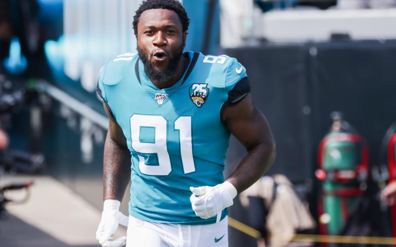 Jacksonville Jaguars defensive end Yannick Ngakou charges onto the field to face the New Orleans Saints before the start of the first quarter at TIAA Bank Field on Oct. 13, 2019 in Jacksonville. (HARRY AARON/Getty Images/TNS)